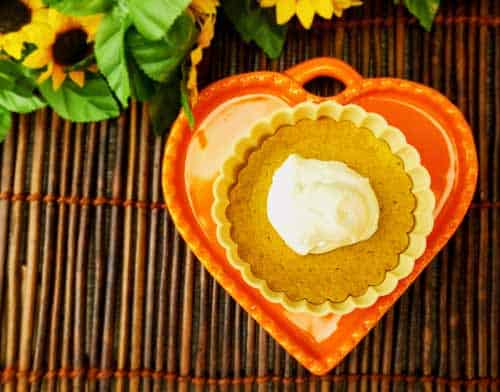Crustless Pumpkin Pie Recipe to die for. All the goodness of pumpkin pie without the carbs and grains. 4 Net Carbs. Gluten Free | Keto Friendly | Single Serving Portion Control. #Keto #Thanksgiving #CrustlessPie #PumpkinPie #KetoThanksgiving